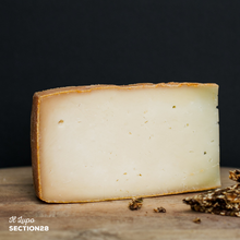 Load image into Gallery viewer, Il Lupo, a washed rind cheese washed in cider made by Section28.
