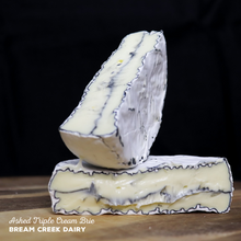 Load image into Gallery viewer, Ashed Triple Cream Brie made by Bream Creek Dairy.
